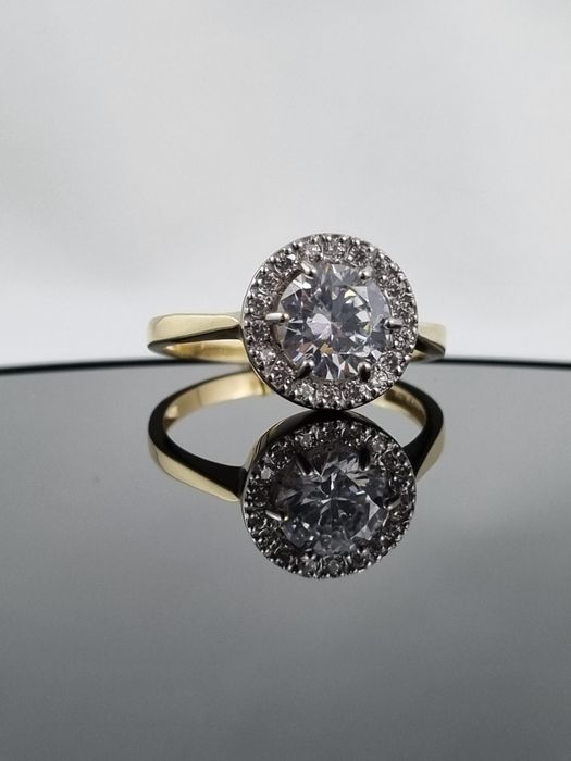 Złoty nowy damski pierścionek z dużym białym oczkiem 585