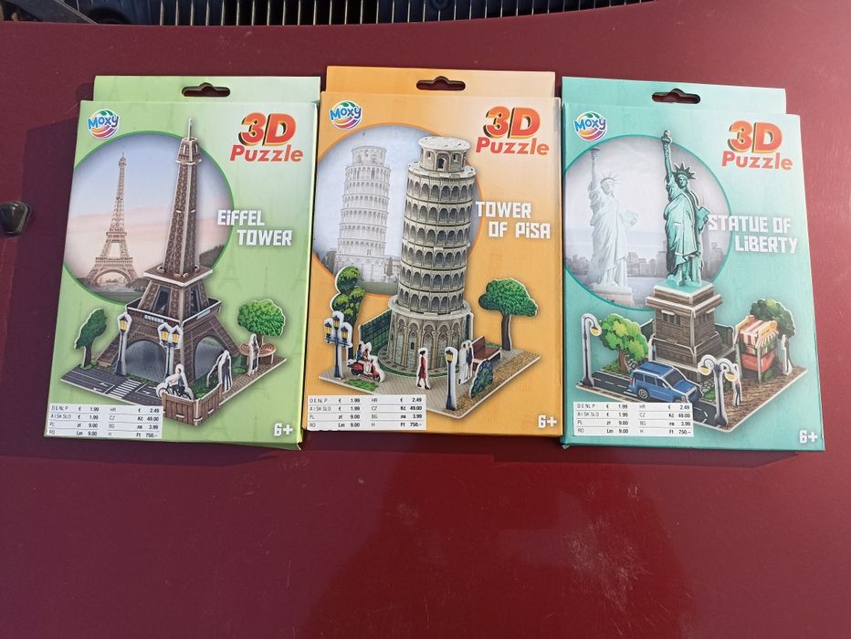 Trzy paczki Puzzli 3D Wieża Eiffla,krzywa wieża i statua wolności