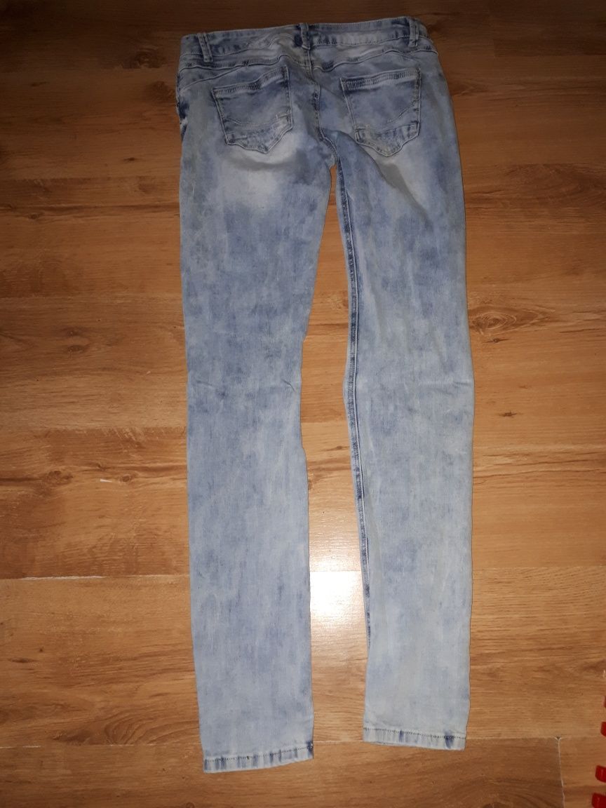 Spodnie jeans roz L/XL