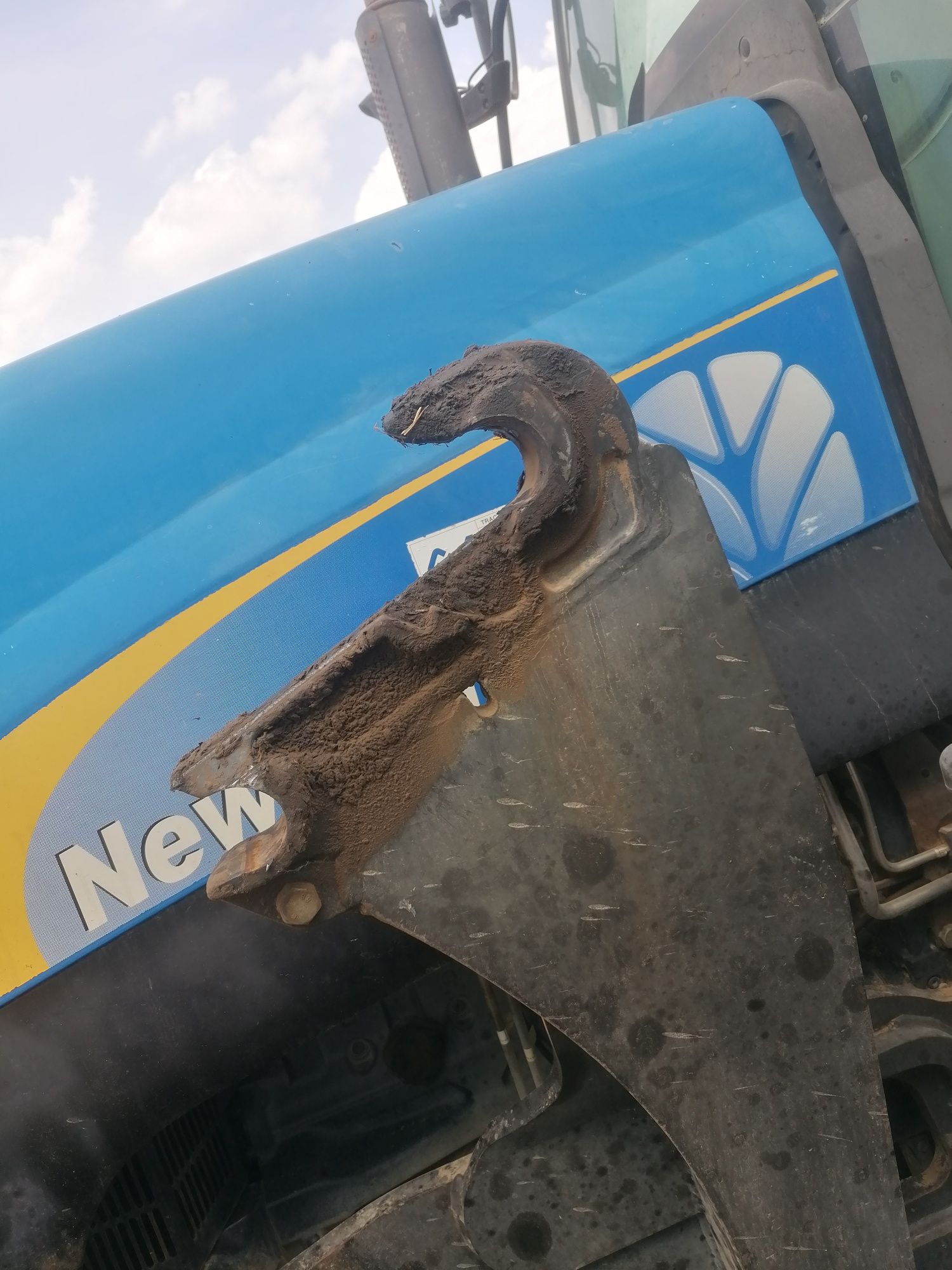 Adaptacja New Holland, mailleux