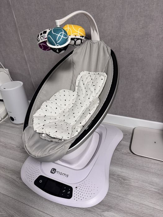 Заколисуючий центр 4Moms