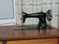 Máquina de costura singer