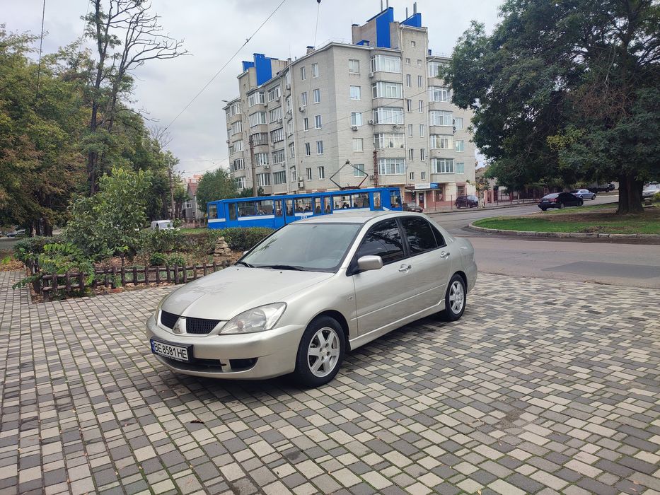 Продам Mitsubishi Lancer ,автомат коробка.