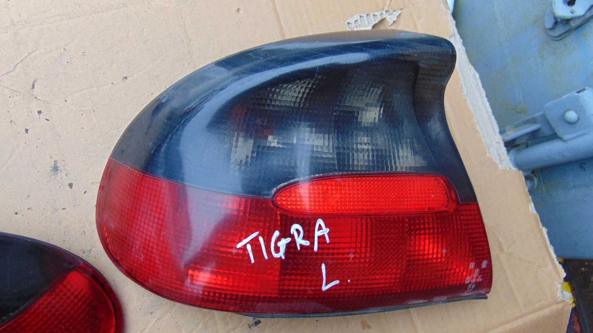 Mar55 Lampa lewa tylna lewy tył opel tigra wysyłka