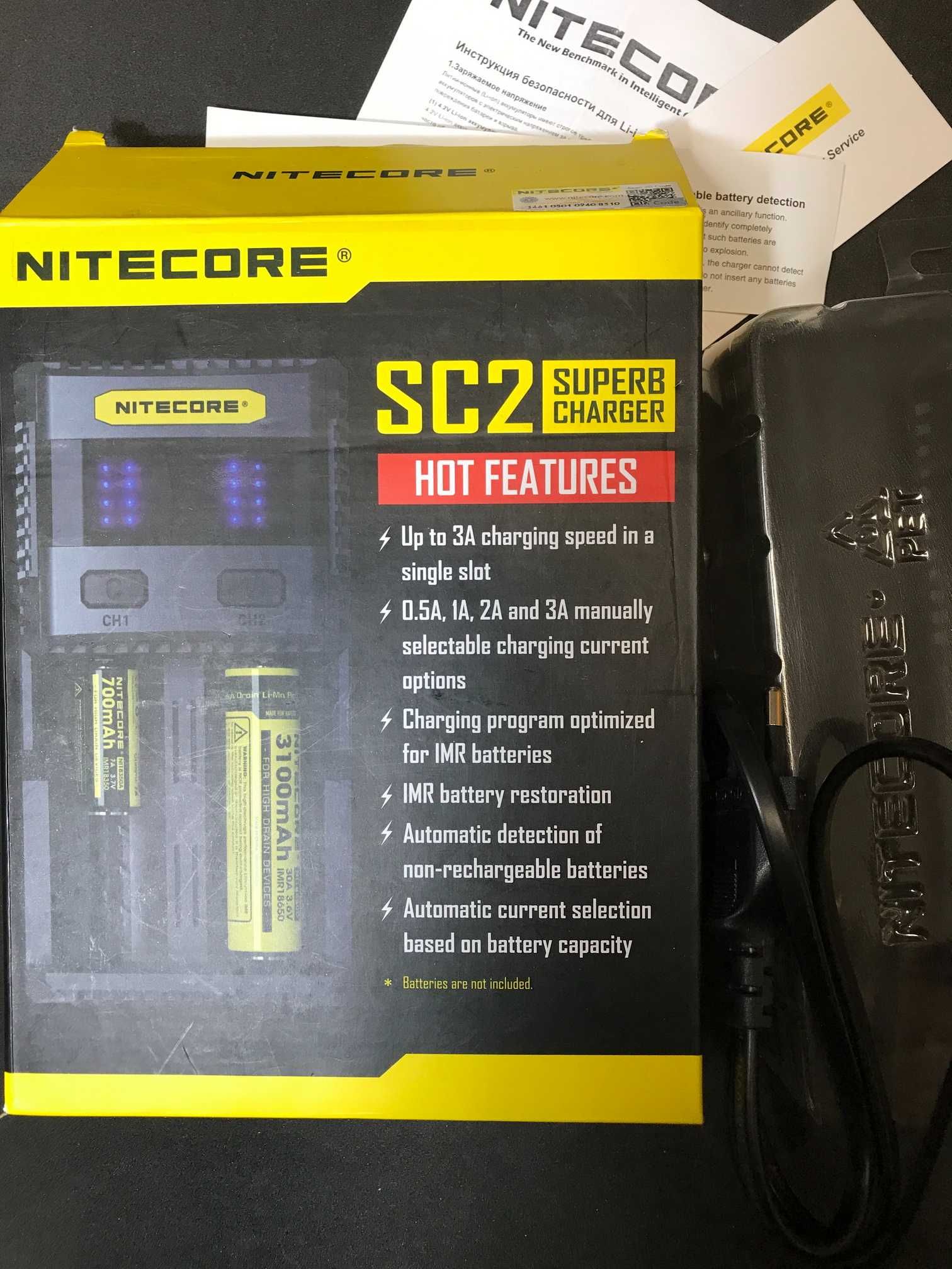 Продам универсальное зарядное устройство Nitecore SC2 Superb Charger