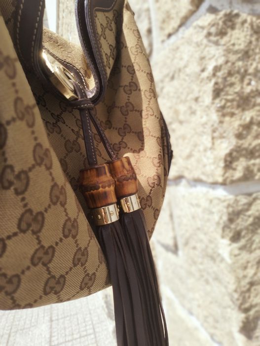 Gucci Bolsa GG Canvas Mini Babouska Indy