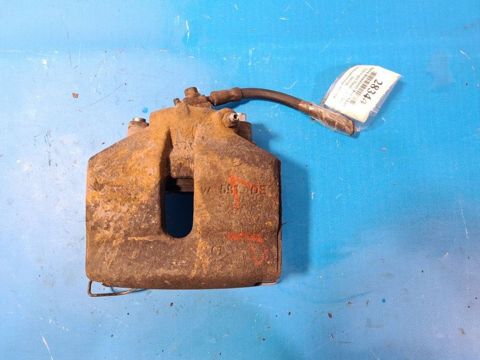 VW PASSAT B6 2.0 TDI ZACISK HAMULCOWY PRZÓD LEWY