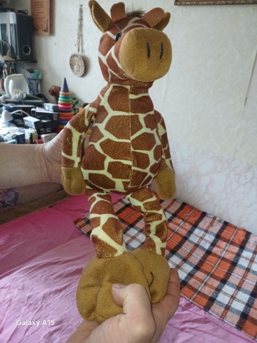Продам жирафа игрушку