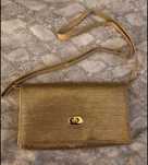 Clutch dourada nova