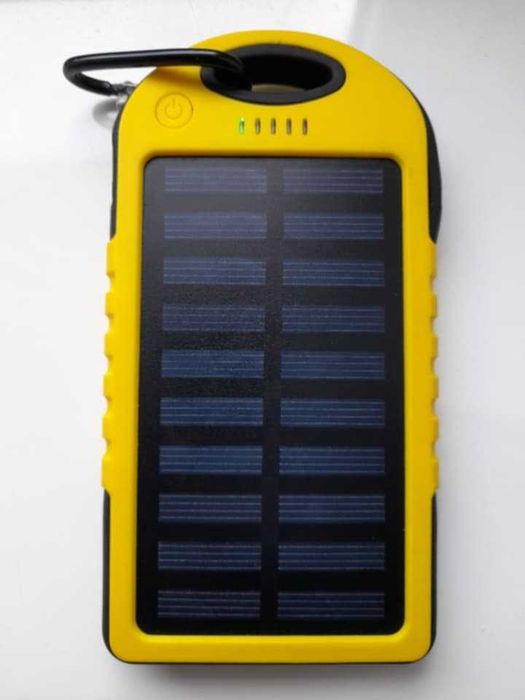 Sprzedam powerbank solarny żółto-czarny – bardzo dobry stan!