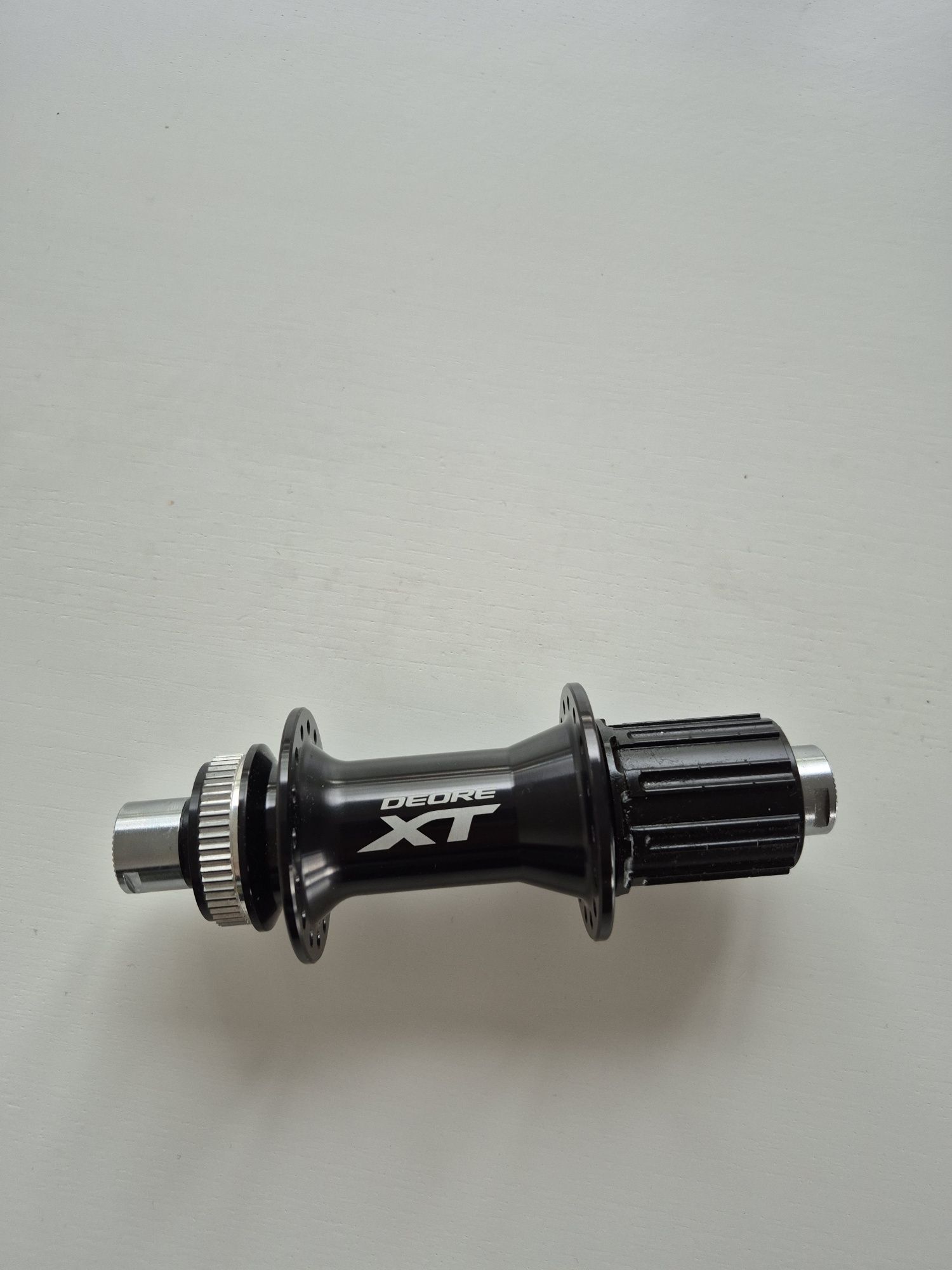 Piasta Shimano Deore XT 148mm 32 otwory bębenek Shimano HG