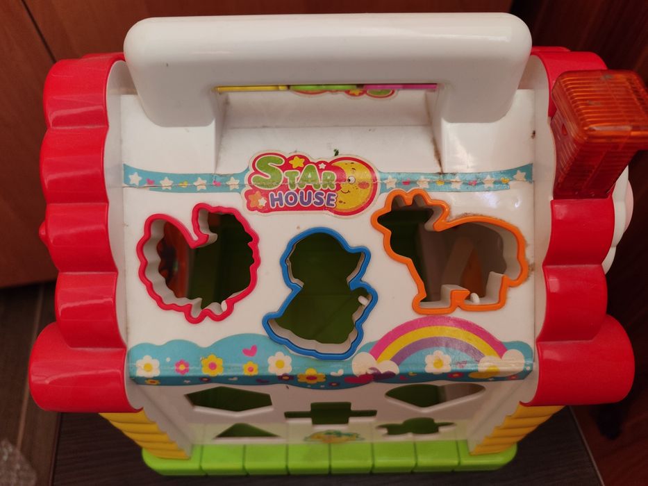 Дитячий розвиваючий, музичний будиночок сортер.