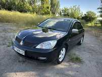 Lancer 1.6 бензин кондиціонер