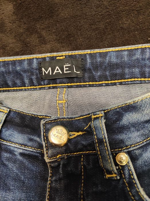 Нові класичні сині джинси розмір М