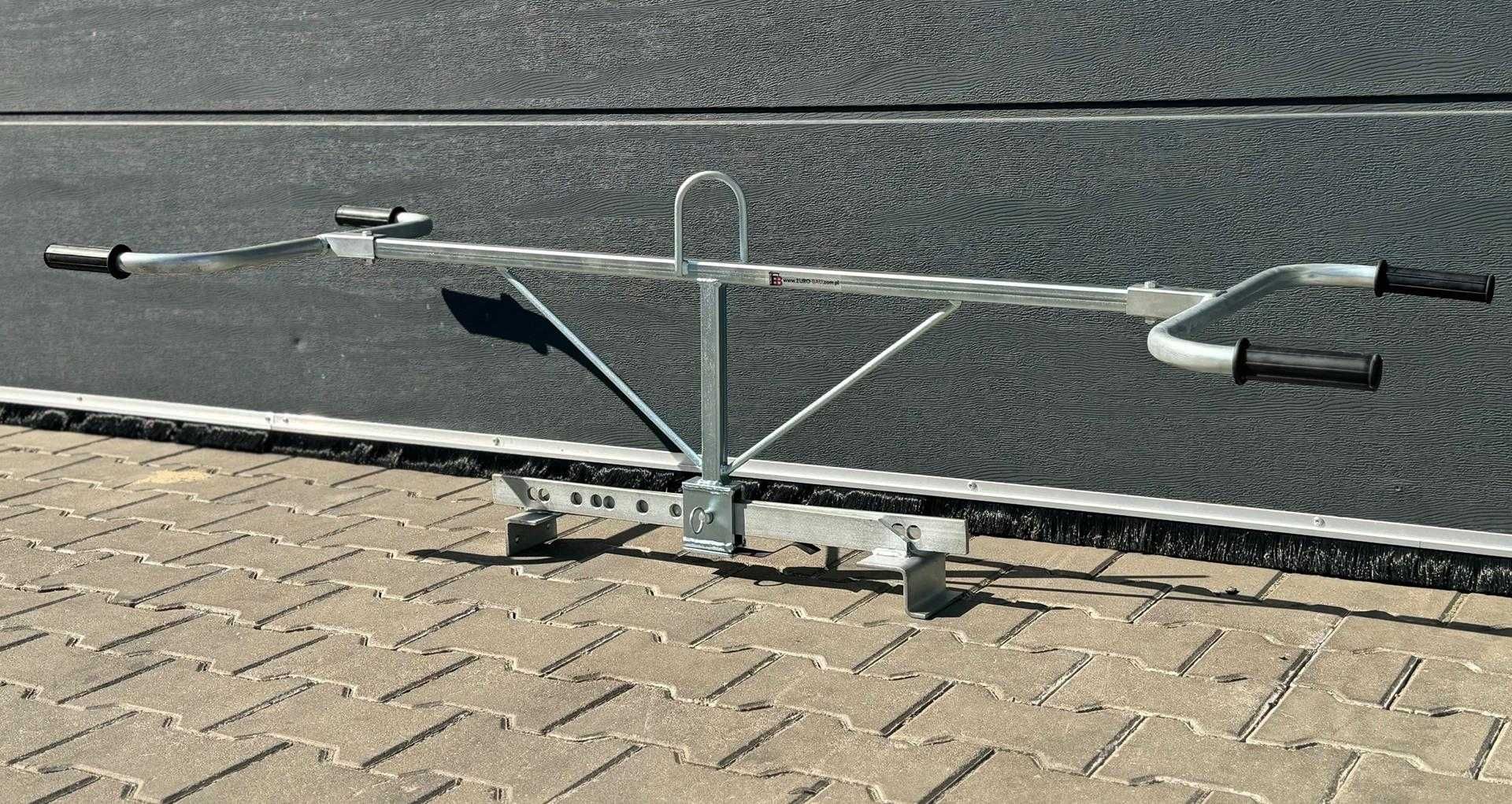 Zawieszany chwytak wzdłużny do krawężników