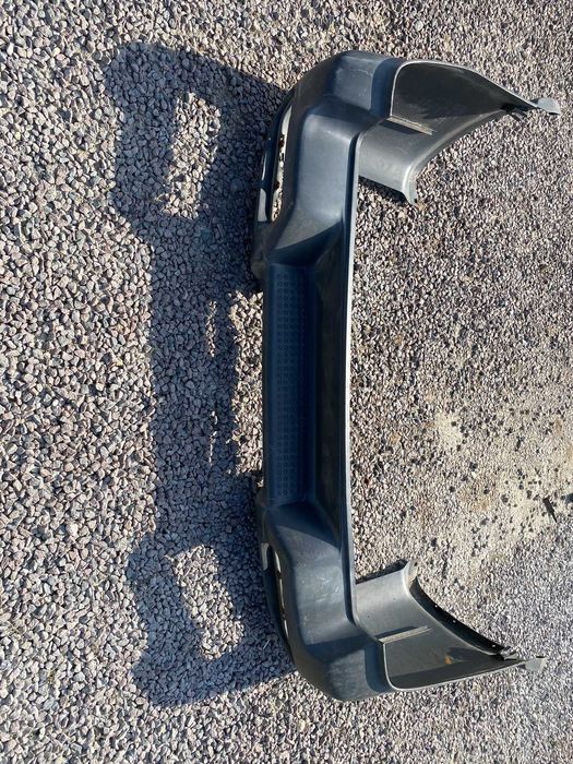 Бампер задній Nissan Terrano I