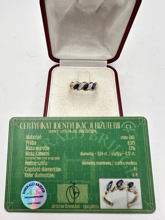 Złoty pierścionek z szafirami 0,57ct i diamentami 0,04ct