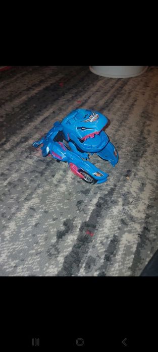 Auto dinozaur grające swiecace