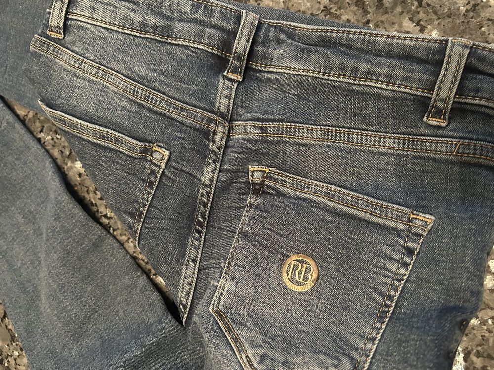 Spodnue jeans Roberta Biagi -zlote guziki r.44