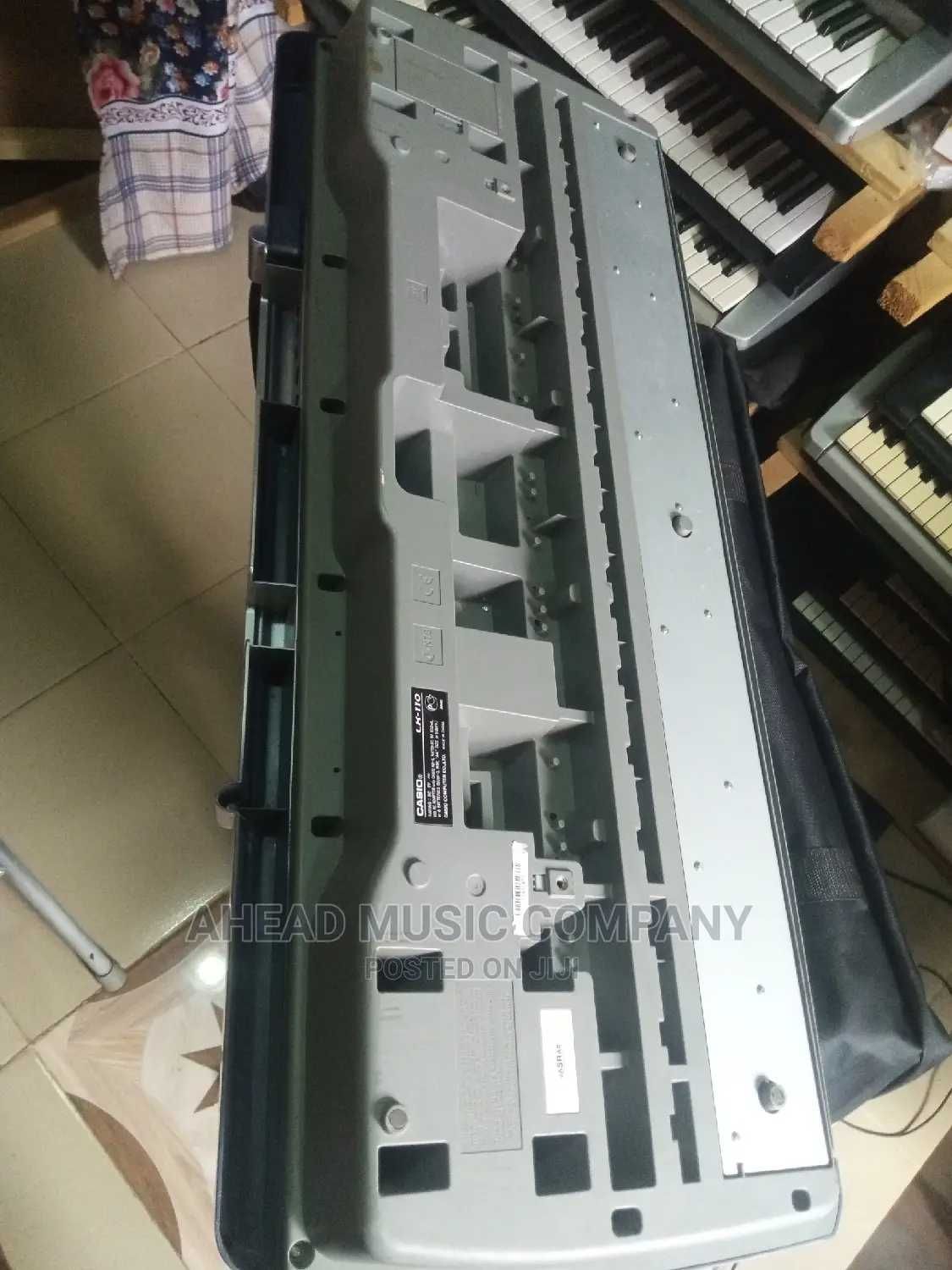Синтезатор Casio LK-110 61 клавиша подсветка обучение США+БП