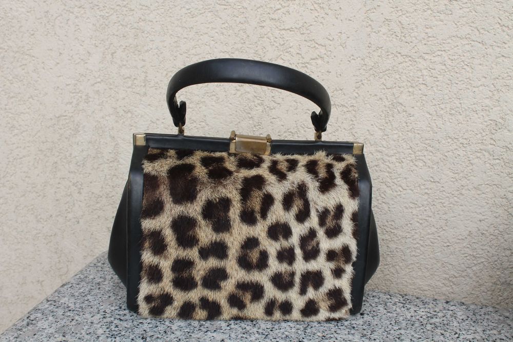 Mala de mão vintage com padrão tigresa