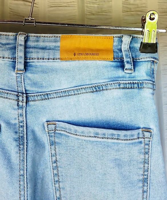 Calças de ganga á boca de sino