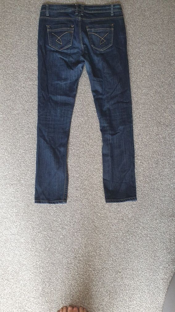 Spodnie jeans r M