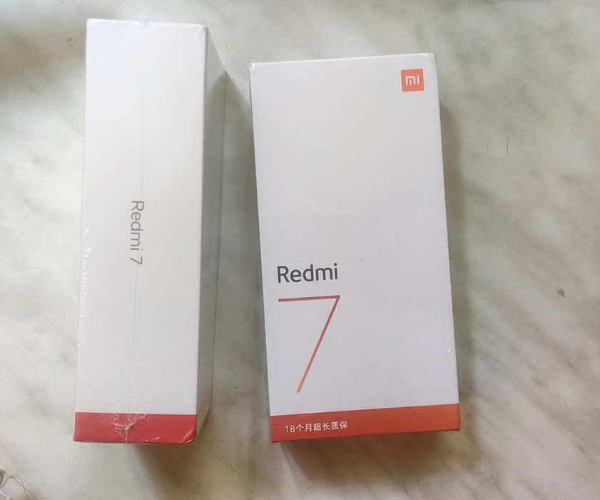 Смартфон Xiaomi Redmi 7 4/64GB черный. Новый, запечатанный чехол, сте