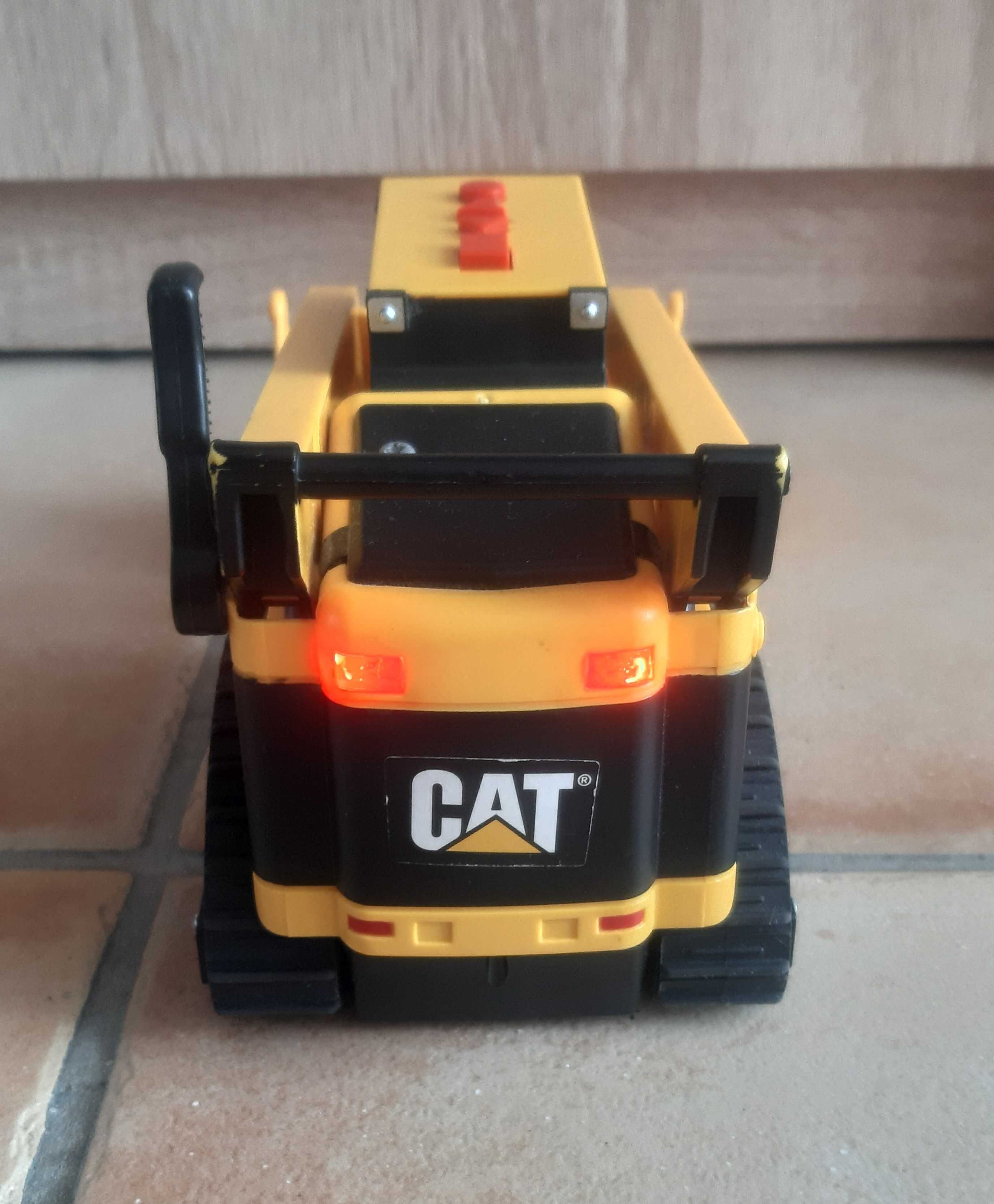 Sprzedam używaną ładowarkę gąsienicową firmy CAT, światło i dźwięk