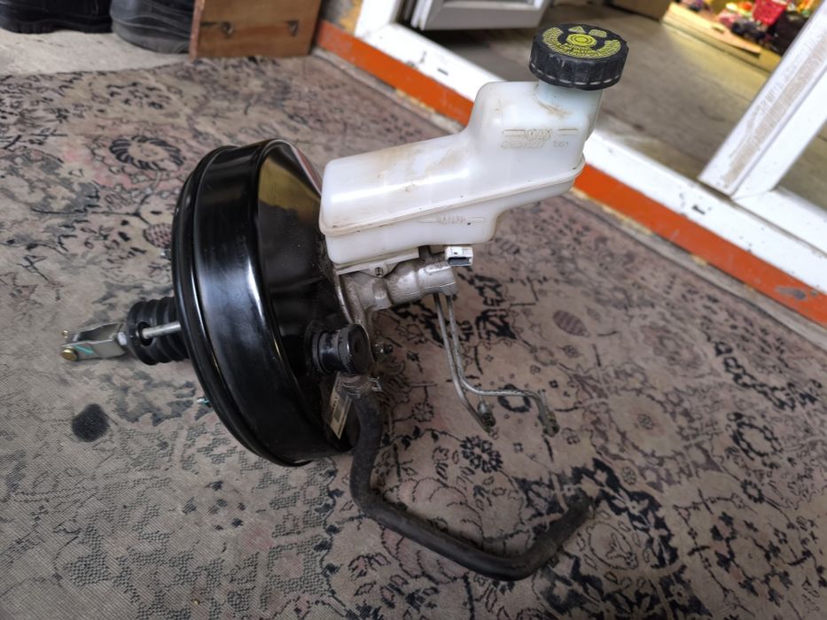 Головний тормозний циліндр з вакуумом на Geely Emgrand ec7