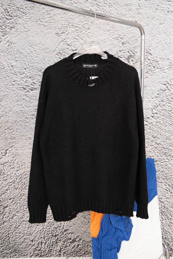 Nowy modny sweter