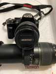 Máquina Pentax e lente 70x300mm
