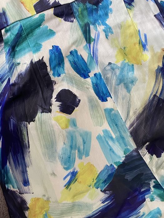 Wzorzysty, elegancki kombinezon z dlugimi nogawkami na jedno ramie