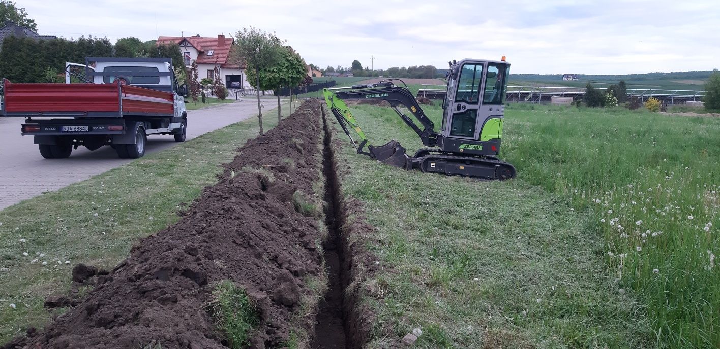 Wszelkie roboty ziemne koparką 3t Transport 3 stronną wywrotką.