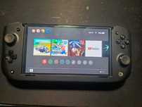 Nintendo Switch OLED + etui + Nitro Deck + gry