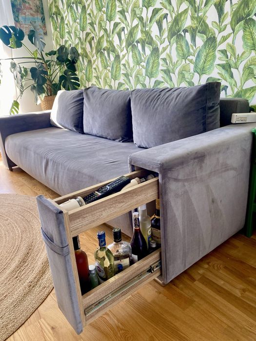 Duża szara rozkładana kanapa ze skrzynią