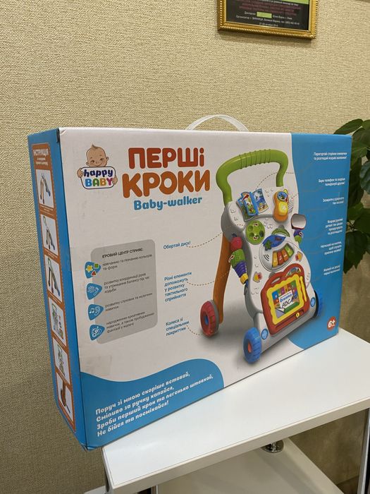 Іграшка Каталка-Ходунки (happy BABY “ПЕРШІ КРОКИ Baby-walker“)