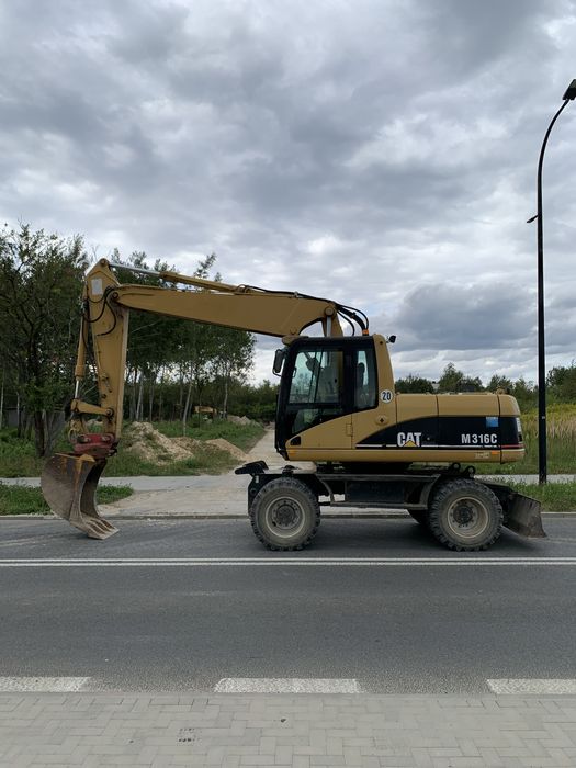 Caterpillar CAT M 316C z Niemiec 9700mth 313 315