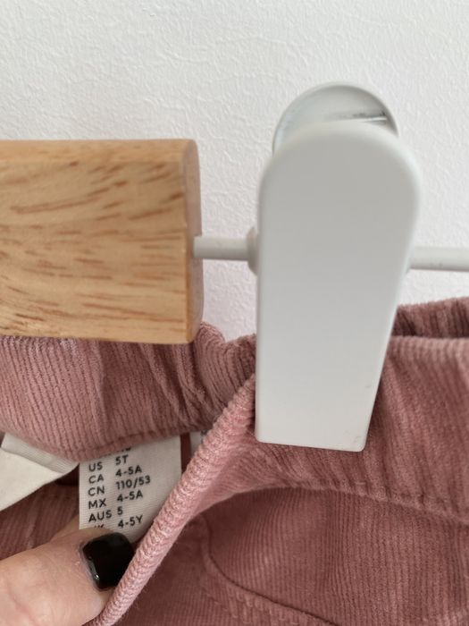 Spodnie h&m 110 pudrowy róż rozszerzana nogawka