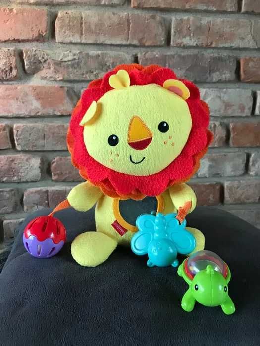 Pluszowy Lew FisherPrice grzechotka / gryzak