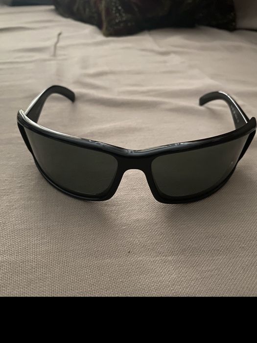 Óculos de sol, lentes esverdeadas