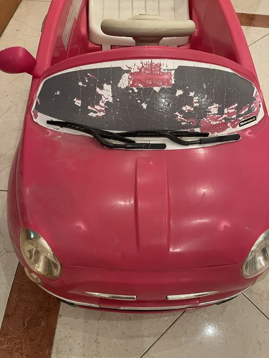 Carro de crianca andar na rua Fiat 500