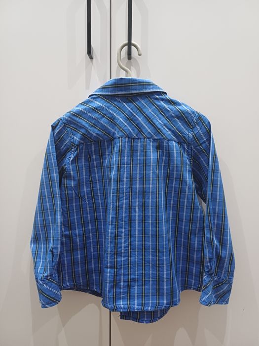 Dwie koszule w kratę dla bliźniaków jedna niebieska, druga zielona