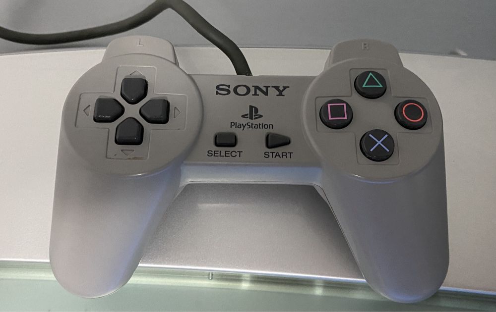 Playstation ps one + jogos e comandos