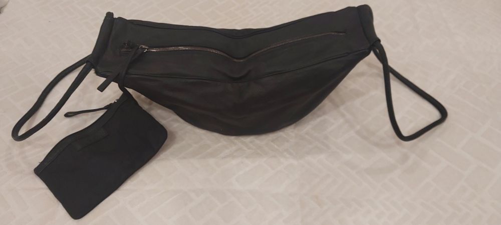 Carteira em pele,praticamente como nova