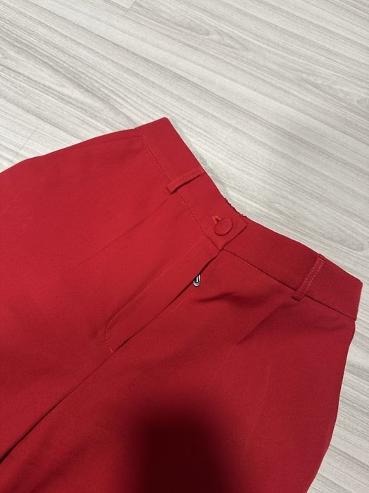 Червоні класичні брюки