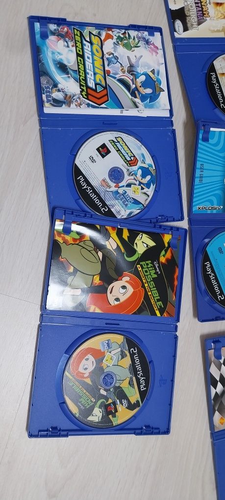 Lote 7 jogos PS2 (completos) – Stitch, Cars, Kim Possible, Sonic, etc.