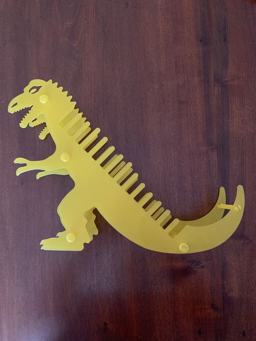 Prateleira de CDs dinossauro (T-Rex)