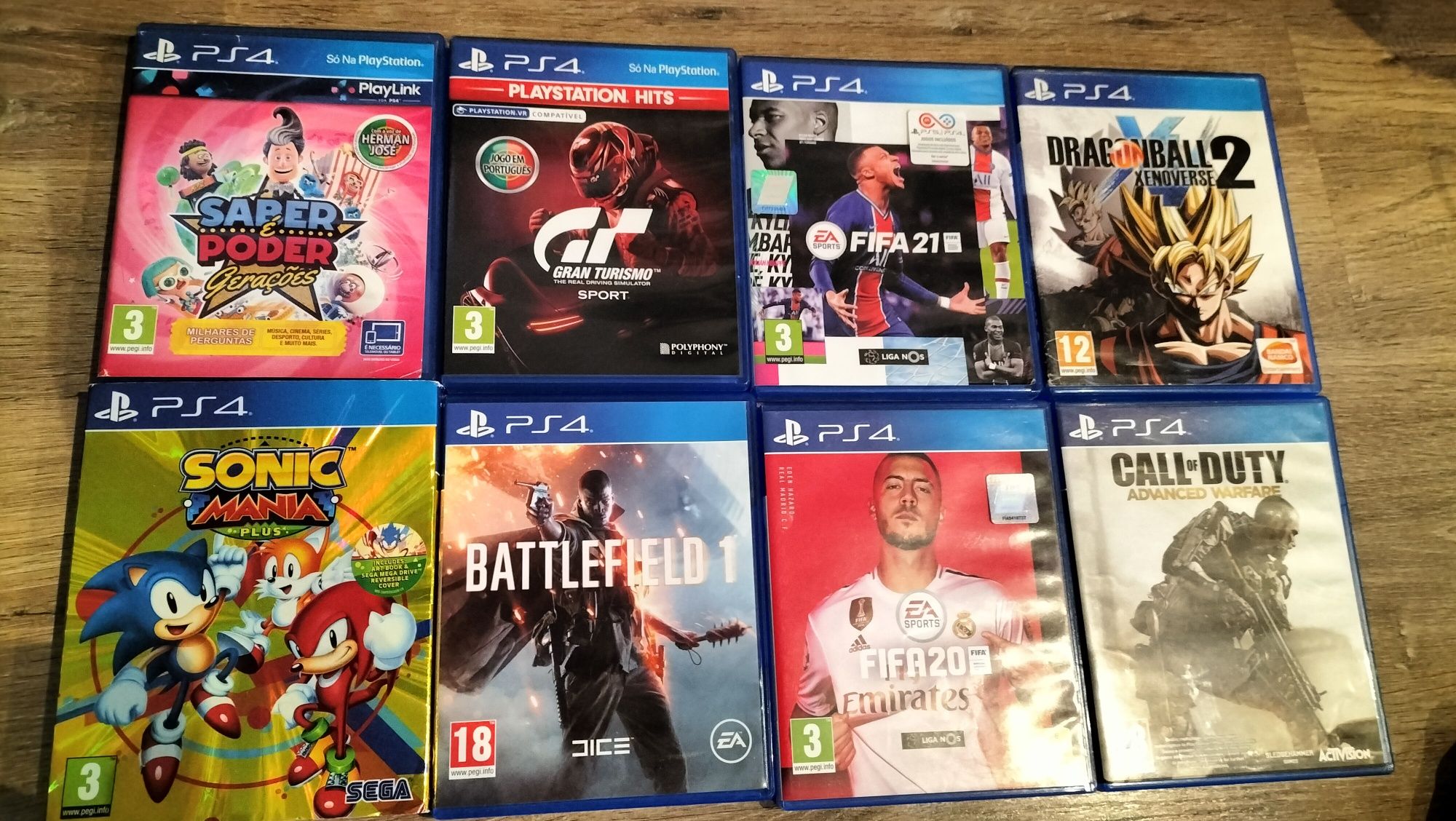 PlayStation 4 + 2 comandos + 8 jogos