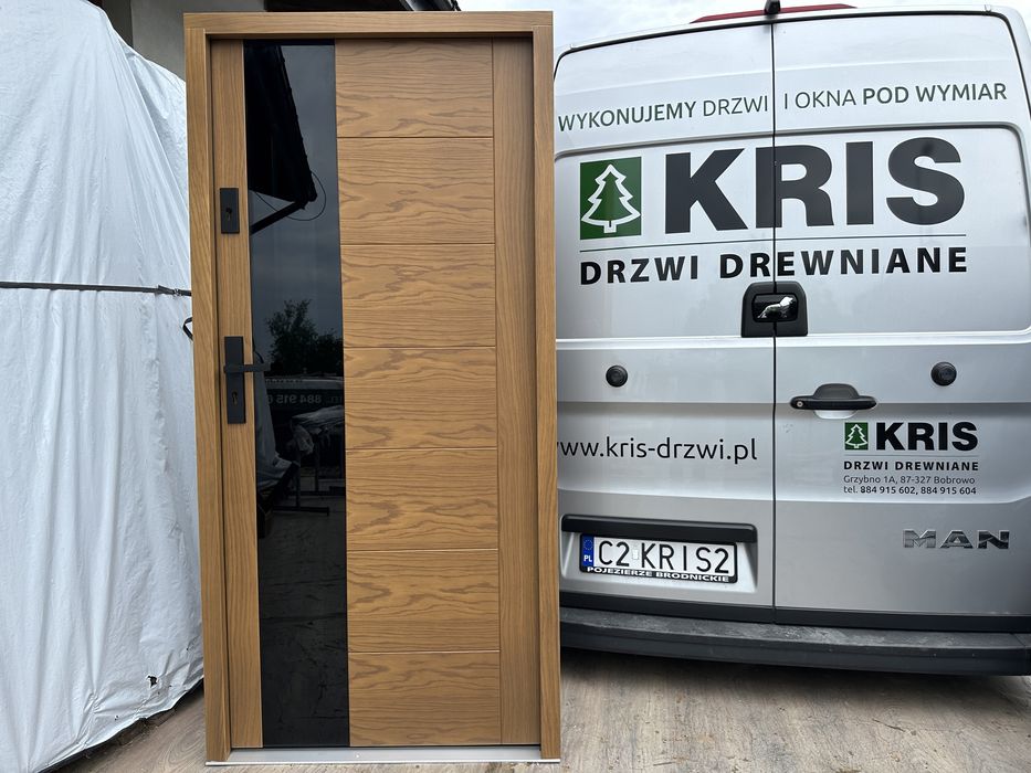 Drzwi zewnetrzne drewniane Montaż Cała Polska dębowe czarna szyba